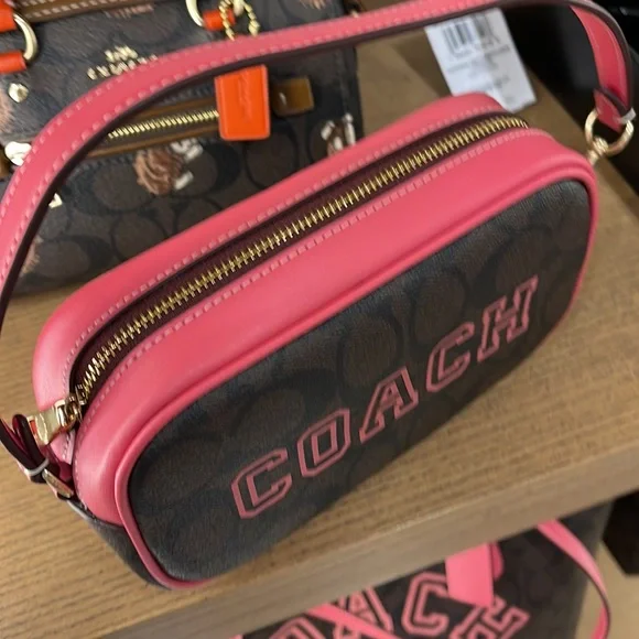 Coach Jamie Wristlet In Signature Canvas With Varsity Motif
IM/Brown/Watermelon - Picture 9 of 16